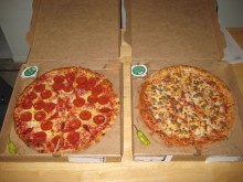 A pair of glorious meatsa pizzas.