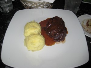 That steak's got balls...of mashed potatoes.